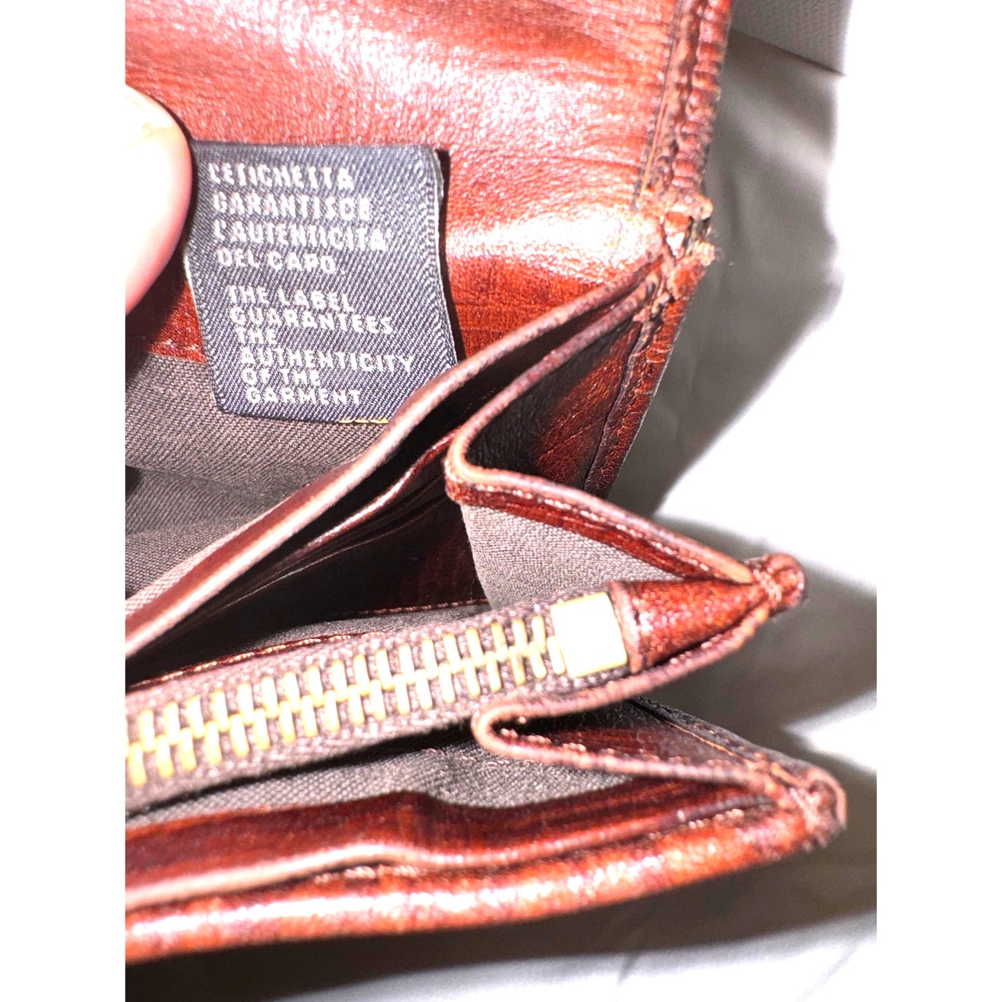Authentic Fendi Zucca Baguette Wallet in Canvas and Leather with Gold Buckle