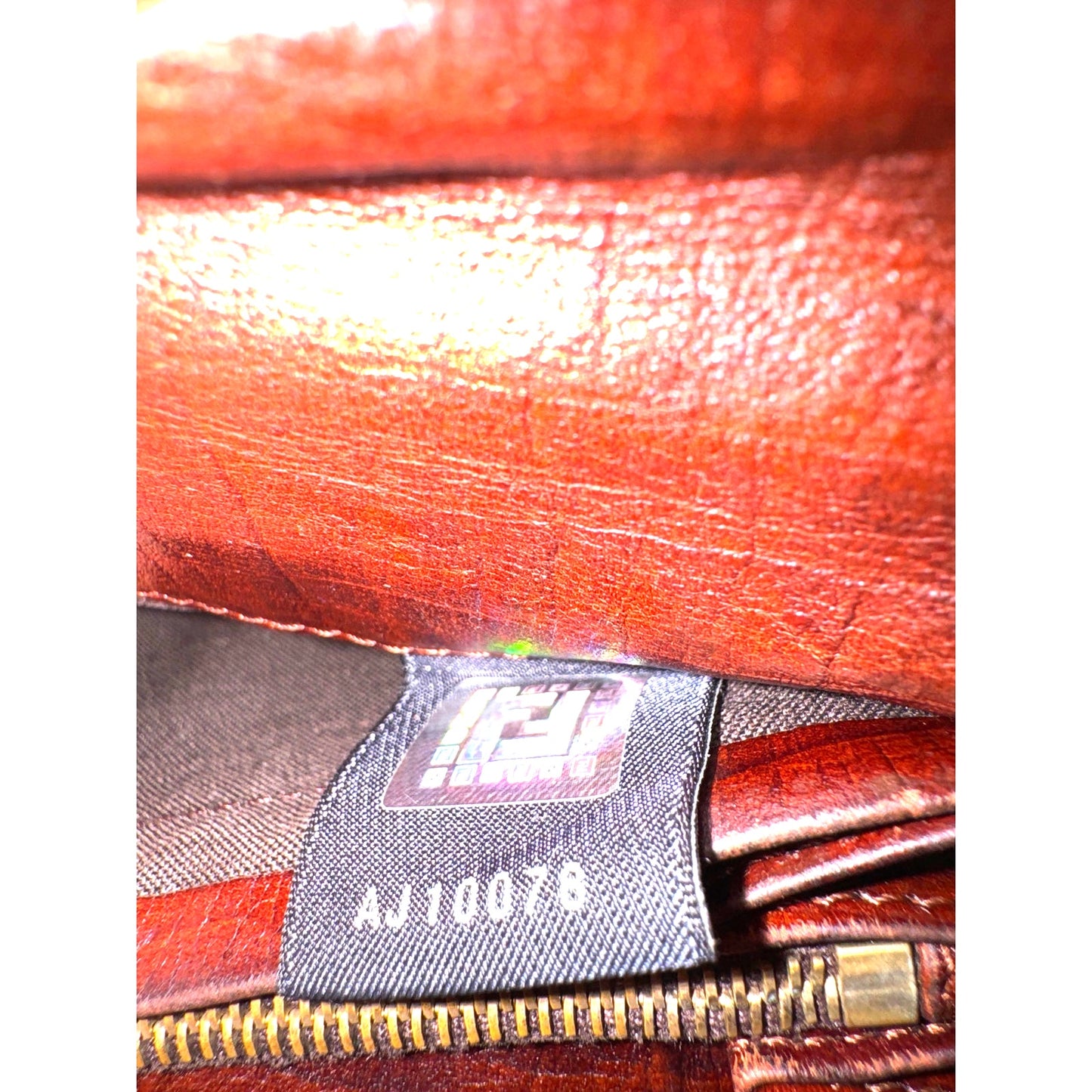 Authentic Fendi Zucca Baguette Wallet in Canvas and Leather with Gold Buckle