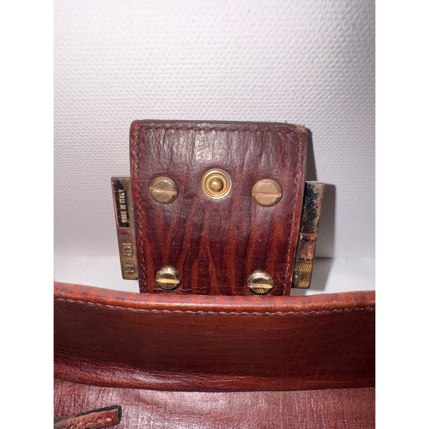 Authentic Fendi Zucca Baguette Wallet in Canvas and Leather with Gold Buckle
