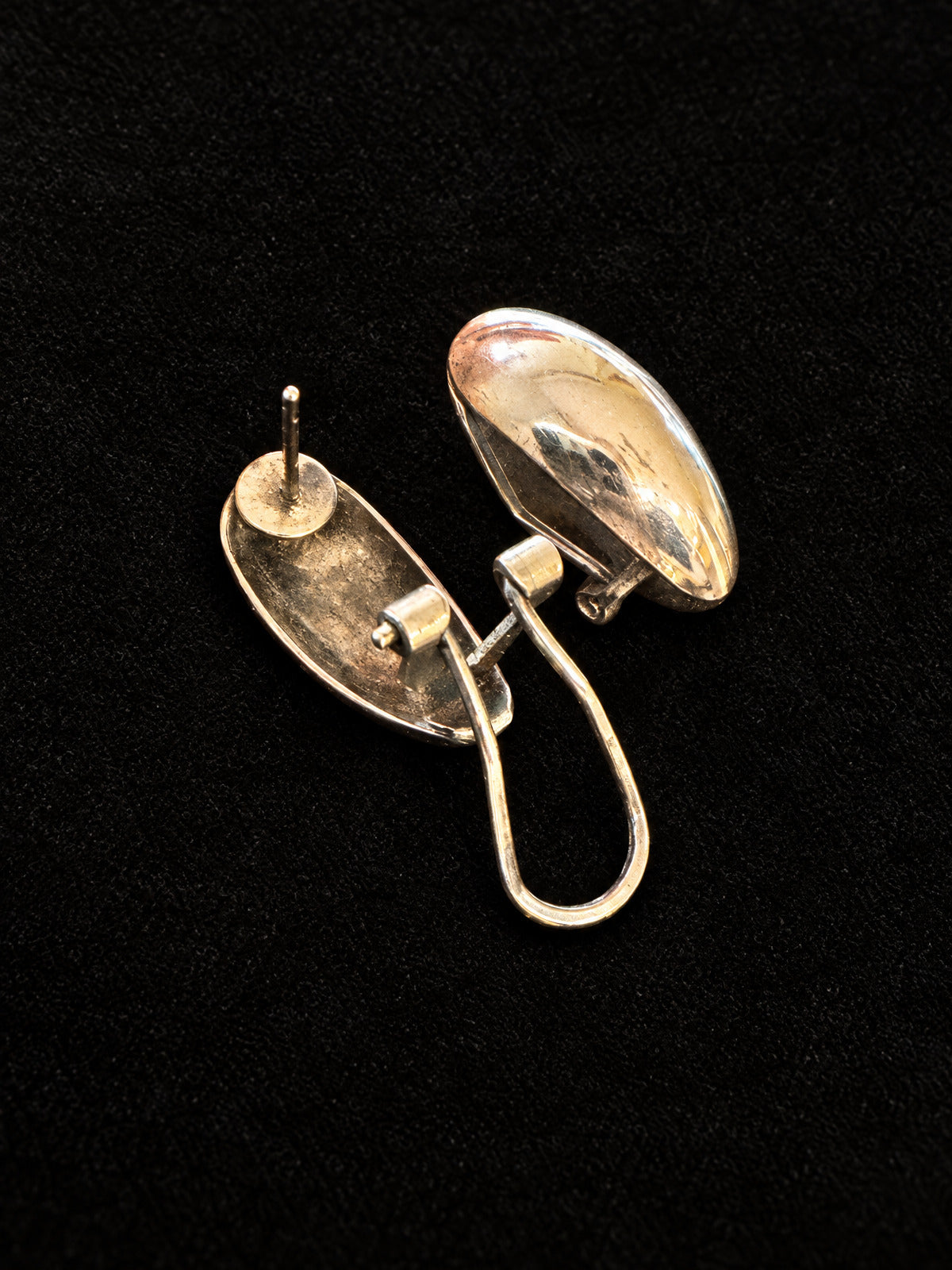 Silver-Tone Domed Oval Earrings · Omega Back (French Clip) · Pierced