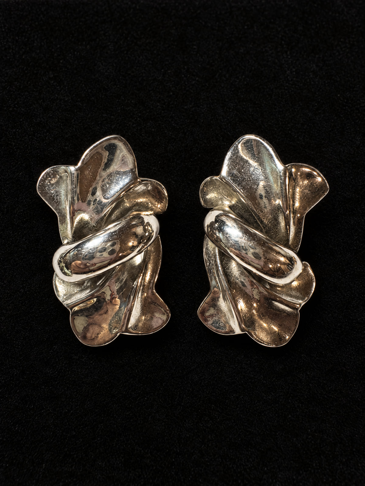 Silver-Tone Draped Ribbon Clip-On Earrings · Statement · Bold